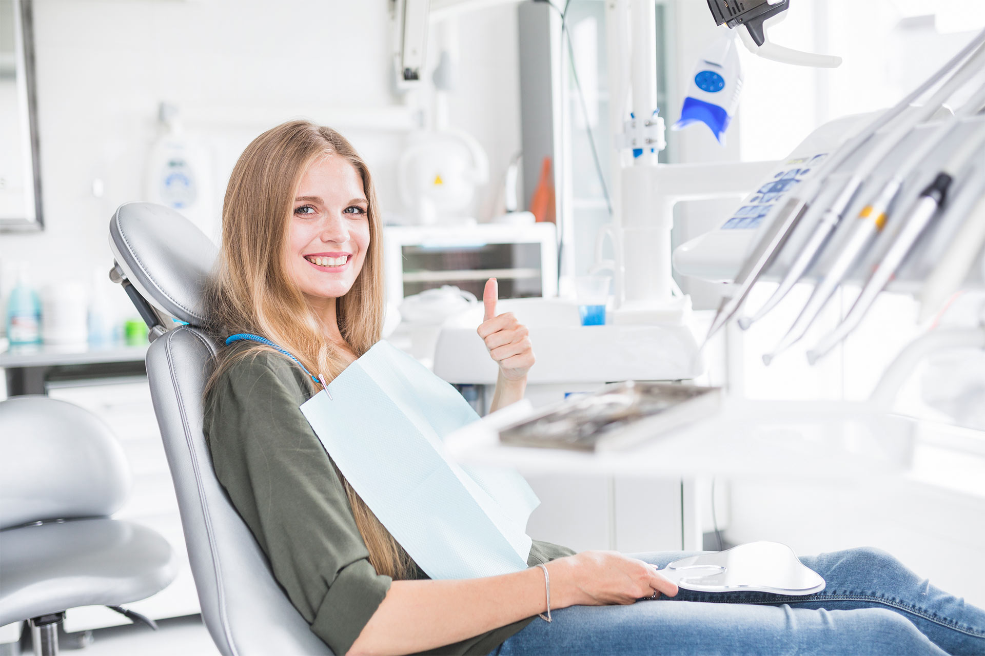A relaxed patient smiling in the dental chair at Finesse Dental